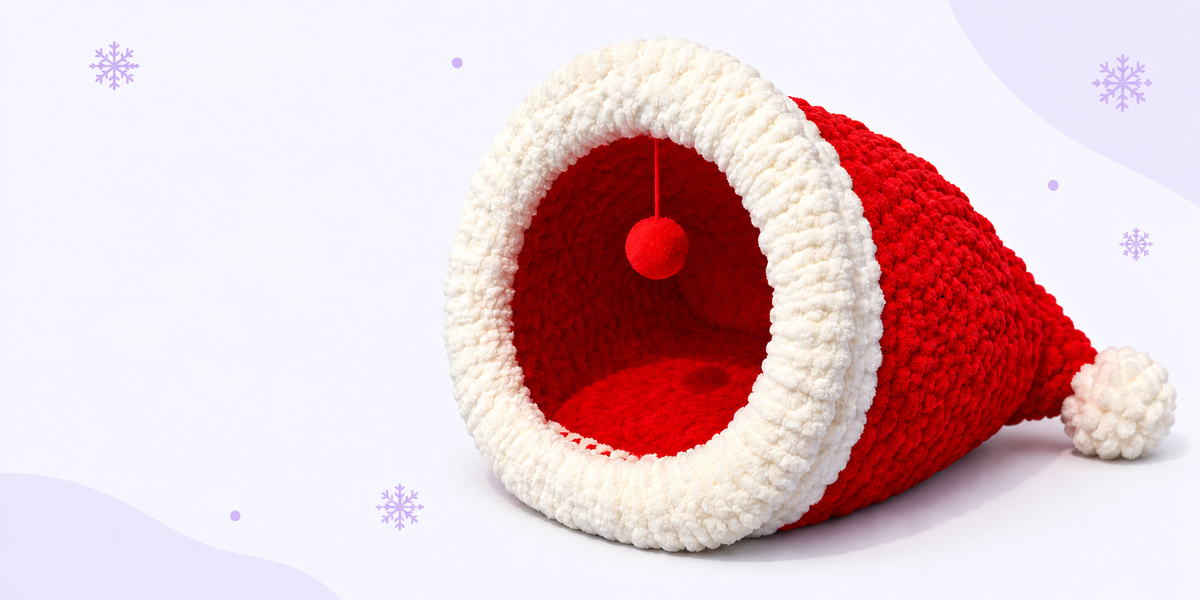 Red and white Christmas cat bed cave shaped like a Santa hat
