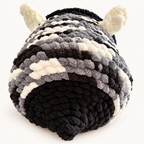 Chunky Knit Cave black, grey and white, back view on warm white background