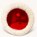 Christmas Chunky Knit Cave in red and white, front view with hanging pom-pom on a warm white background