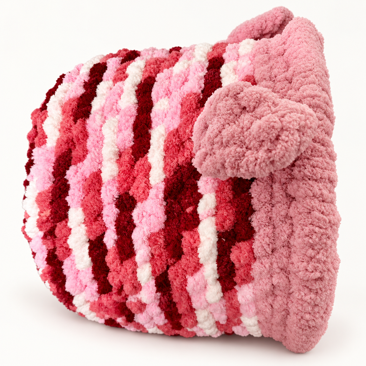Chunky Knit Cave Pink / Red / White side view on warm white background