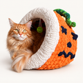 Chunky Knit Cave Pumpkin with ginger Maine Coon cat on warm white background